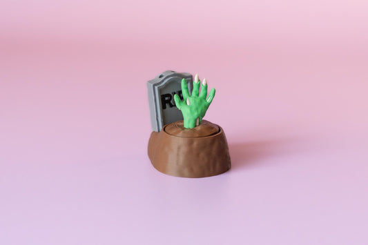 Zombie Hand in Grave Spooky Halloween Fidget Clicker with Wrist Strap or Keychain