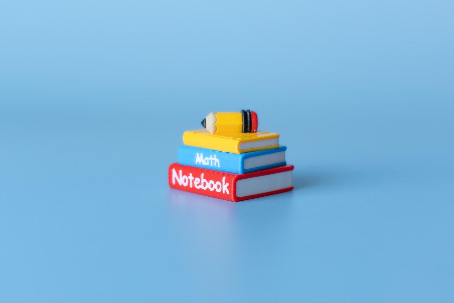 Stack of Books with Pencil Fidget Clicker