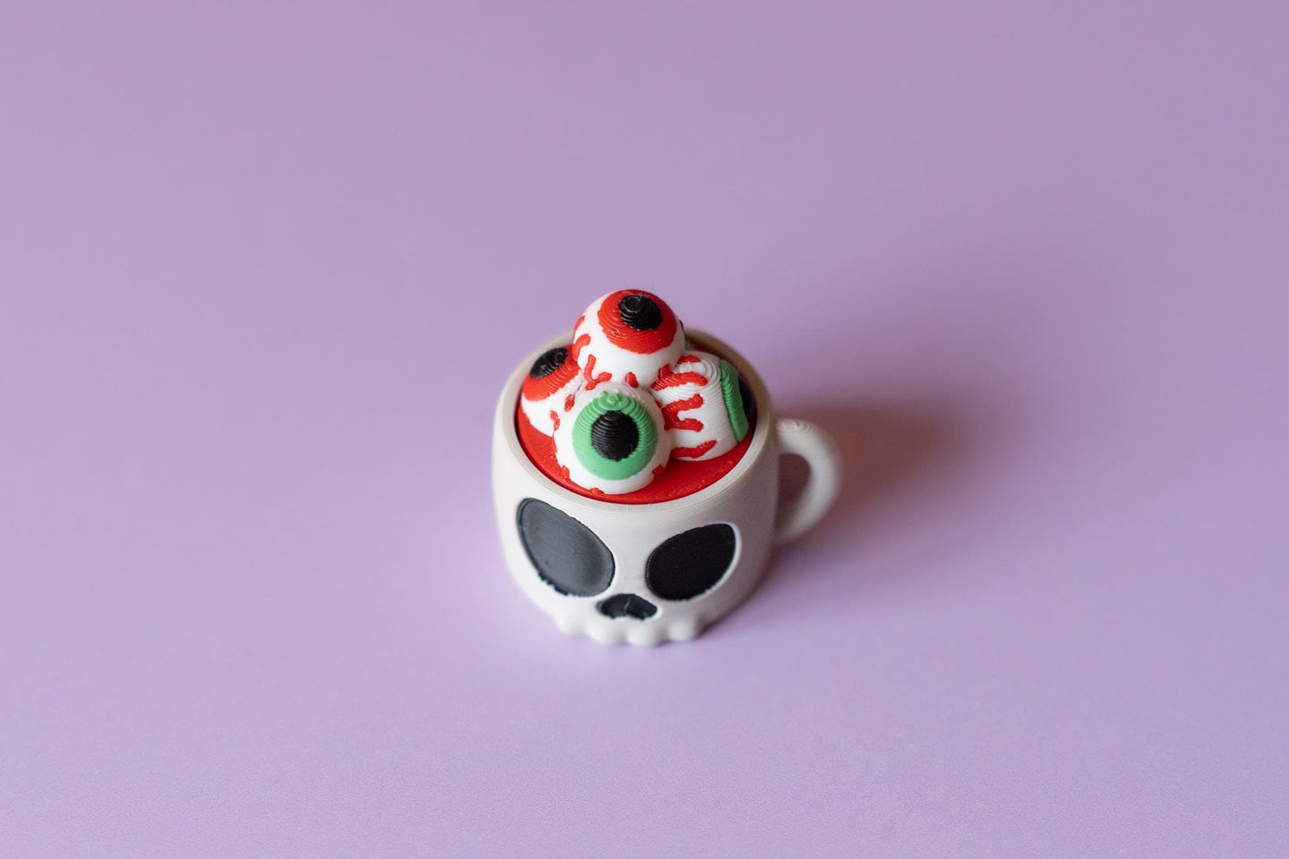 Skull Mug of Eyeballs Spooky Halloween Fidget Clicker with Wrist Strap or Keychain