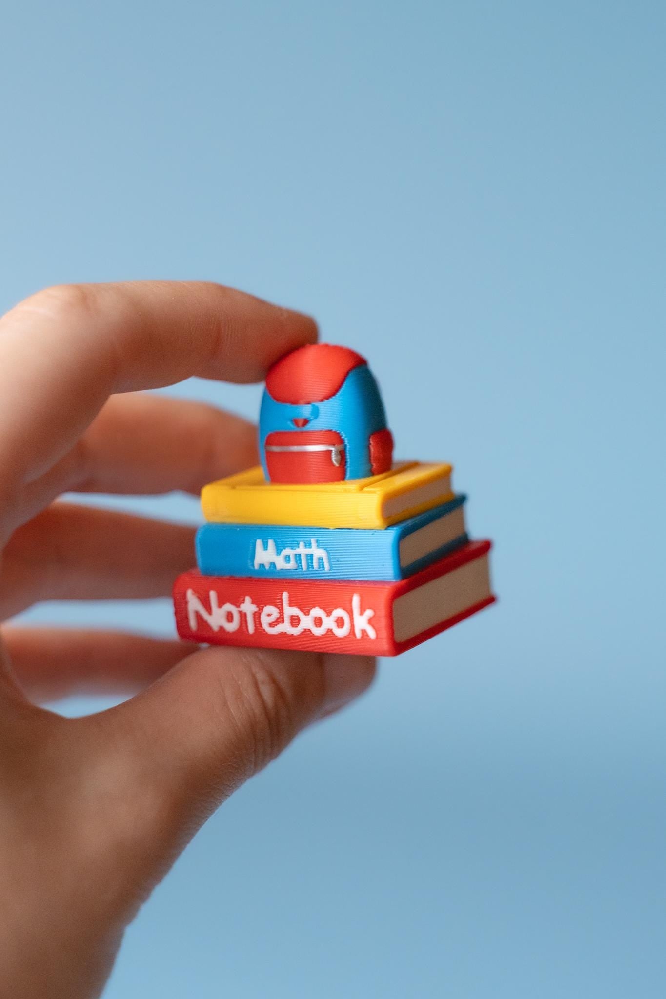 Stack of Books with Backpack Back to School Fidget Clicker with Wrist Strap or Keychain