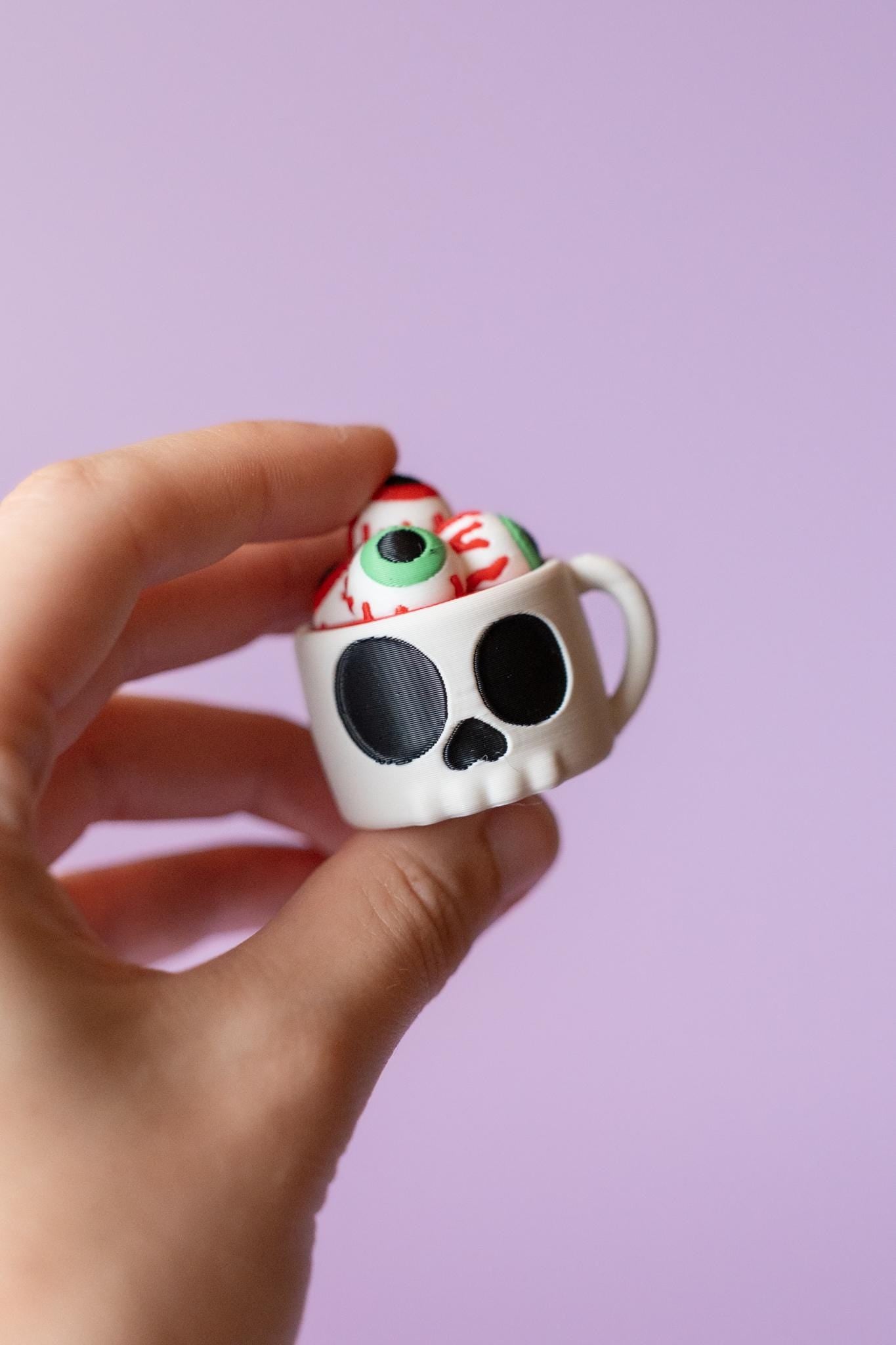 Skull Mug of Eyeballs Spooky Halloween Fidget Clicker with Wrist Strap or Keychain