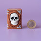 Spellbook with Skull Face Spooky Halloween Fidget Clicker with Wrist Strap or Keychain