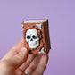 Spellbook with Skull Face Spooky Halloween Fidget Clicker with Wrist Strap or Keychain
