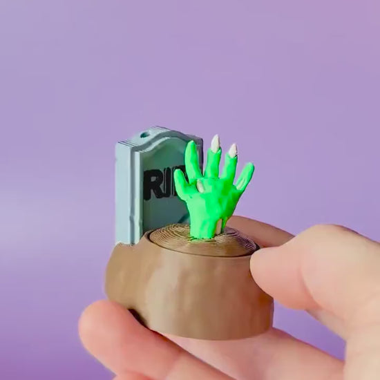 Zombie Hand in Grave Spooky Halloween Fidget Clicker with Wrist Strap or Keychain